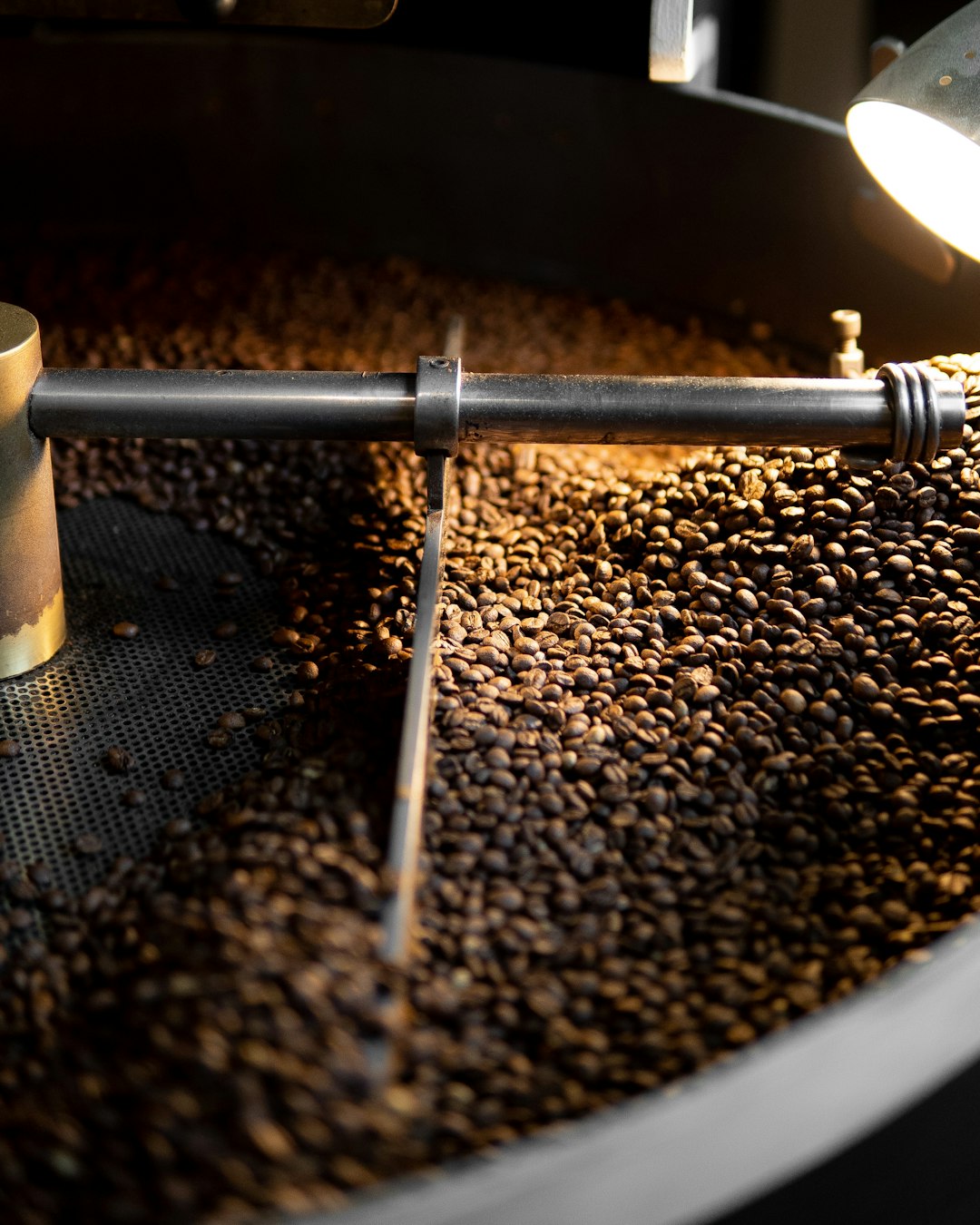 Specialty coffee beans roasting in a coffee roaster